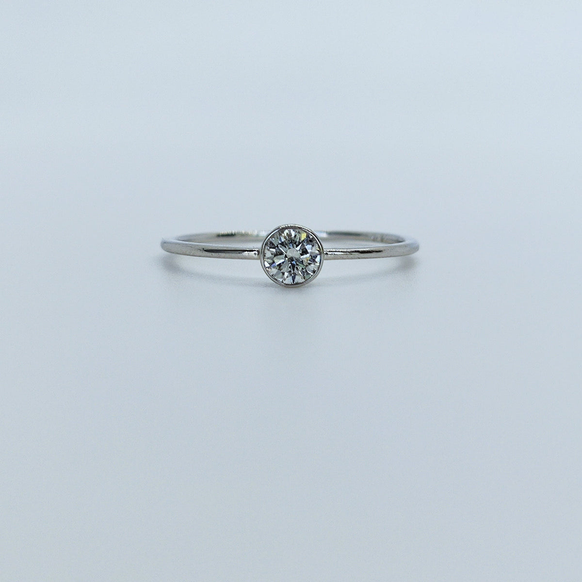 Solitario Petite Oro Blanco 18K