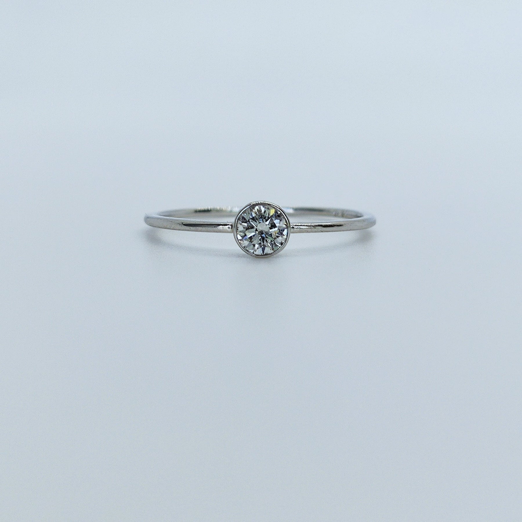 Solitario Petite Oro Blanco 18K