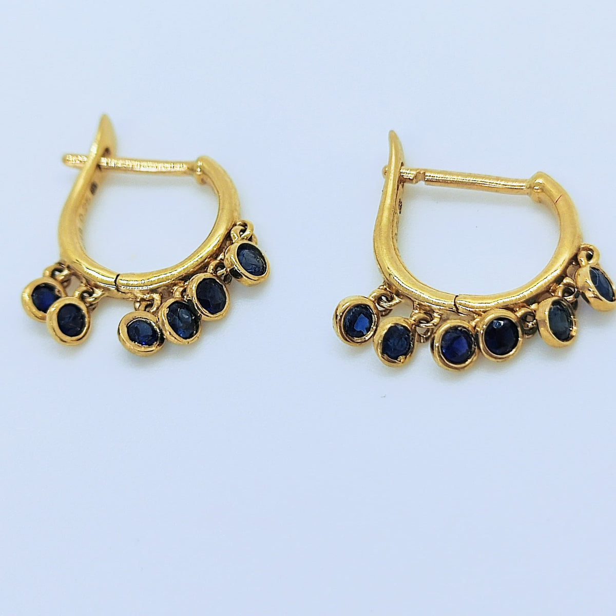 Argollas Cascada Oro Amarillo 18K Zafiros