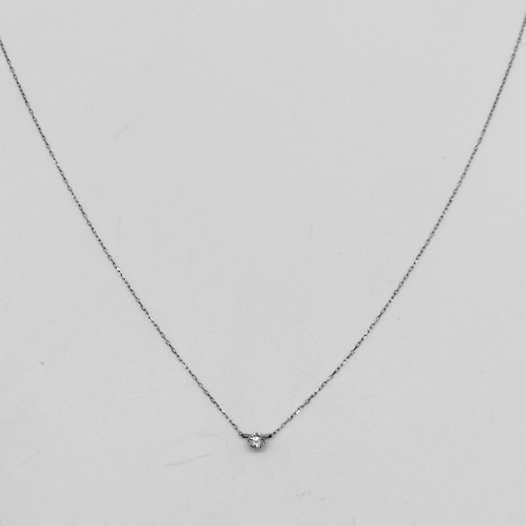 Punto De Luz Oro Blanco 18K Engaste Invisible 10 Puntos