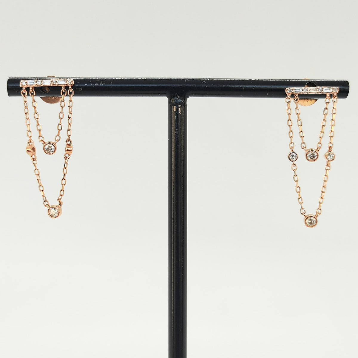 Aros Cascada Oro Rosado 18K Diamantes Baguette