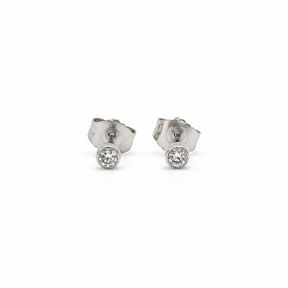 Aros Punto de Luz Bisel Oro Blanco 18K 0,10Ct