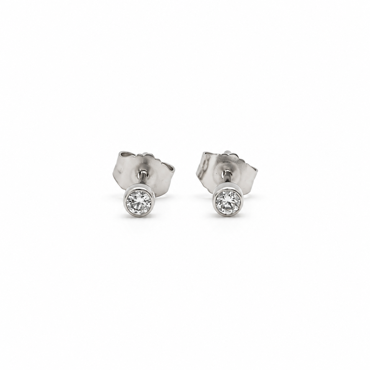 Aros Punto de Luz Bisel Oro Blanco 18K 0,10Ct
