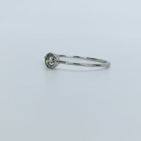 Solitario Petite Oro Blanco 18K