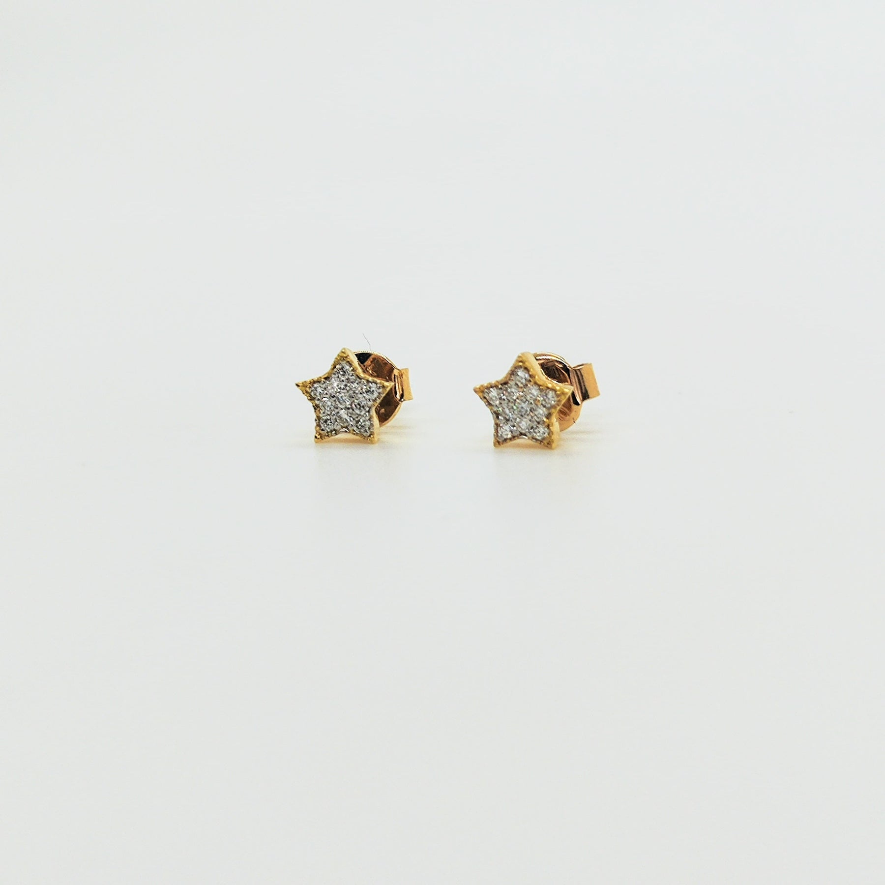 Aros Estrellas Oro Amarillo 18K y Brillantes