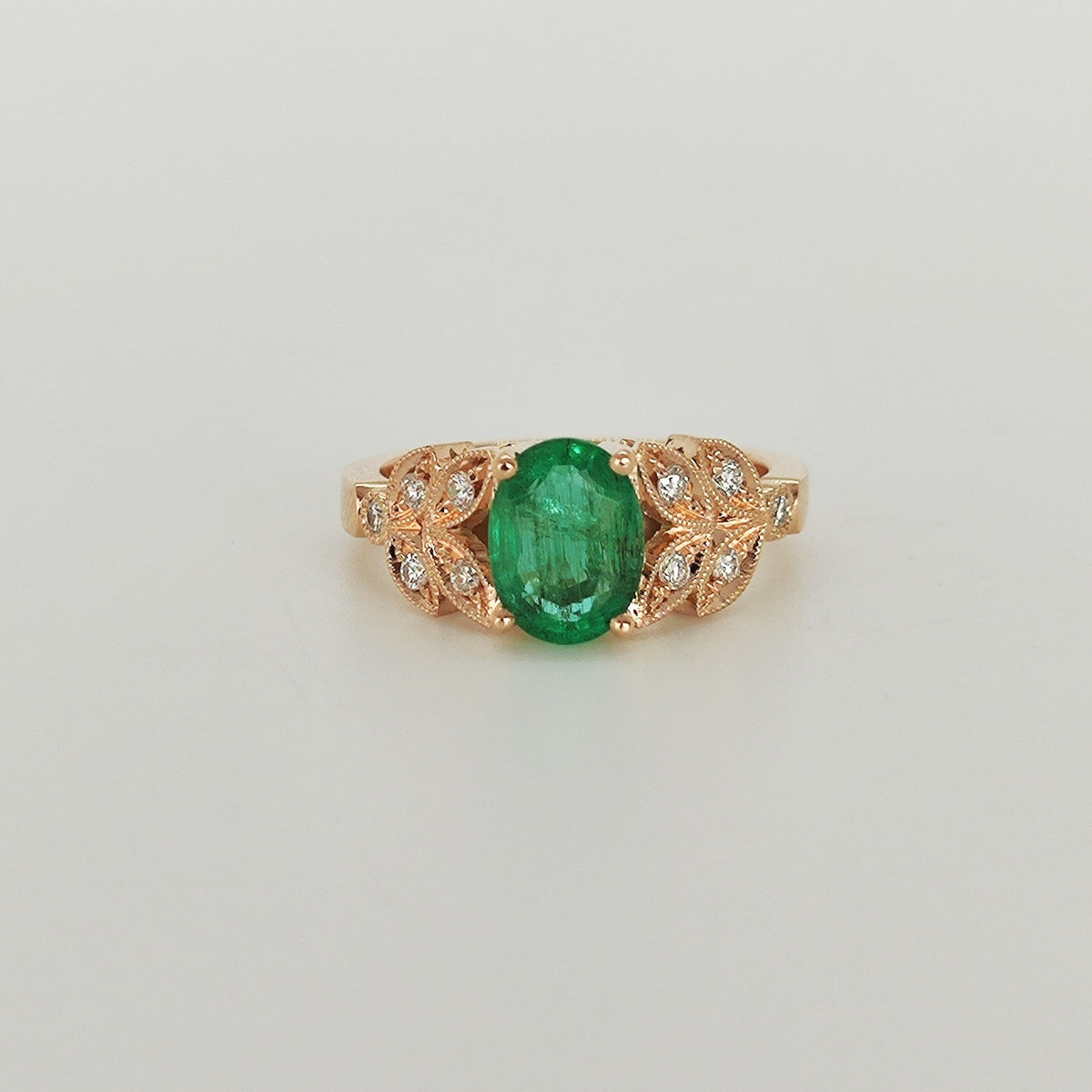 Anillo Hojas Esmeralda Oval 18K