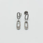 Aros Eslabones Rectangulares con Diamantes Corte Brillante y Corte Baguette en Oro Blanco 18K