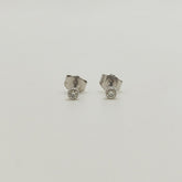 Aros Punto de Luz Bisel Oro Blanco 18K 0,10Ct