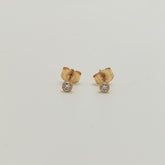Aros Punto de Luz Bisel Oro Amarillo 18K 0,10Ct