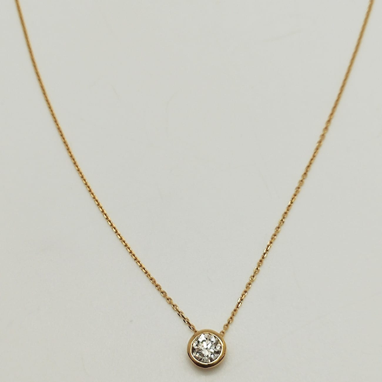 Punto de Luz Bisel 50 Puntos Oro Amarillo 18K