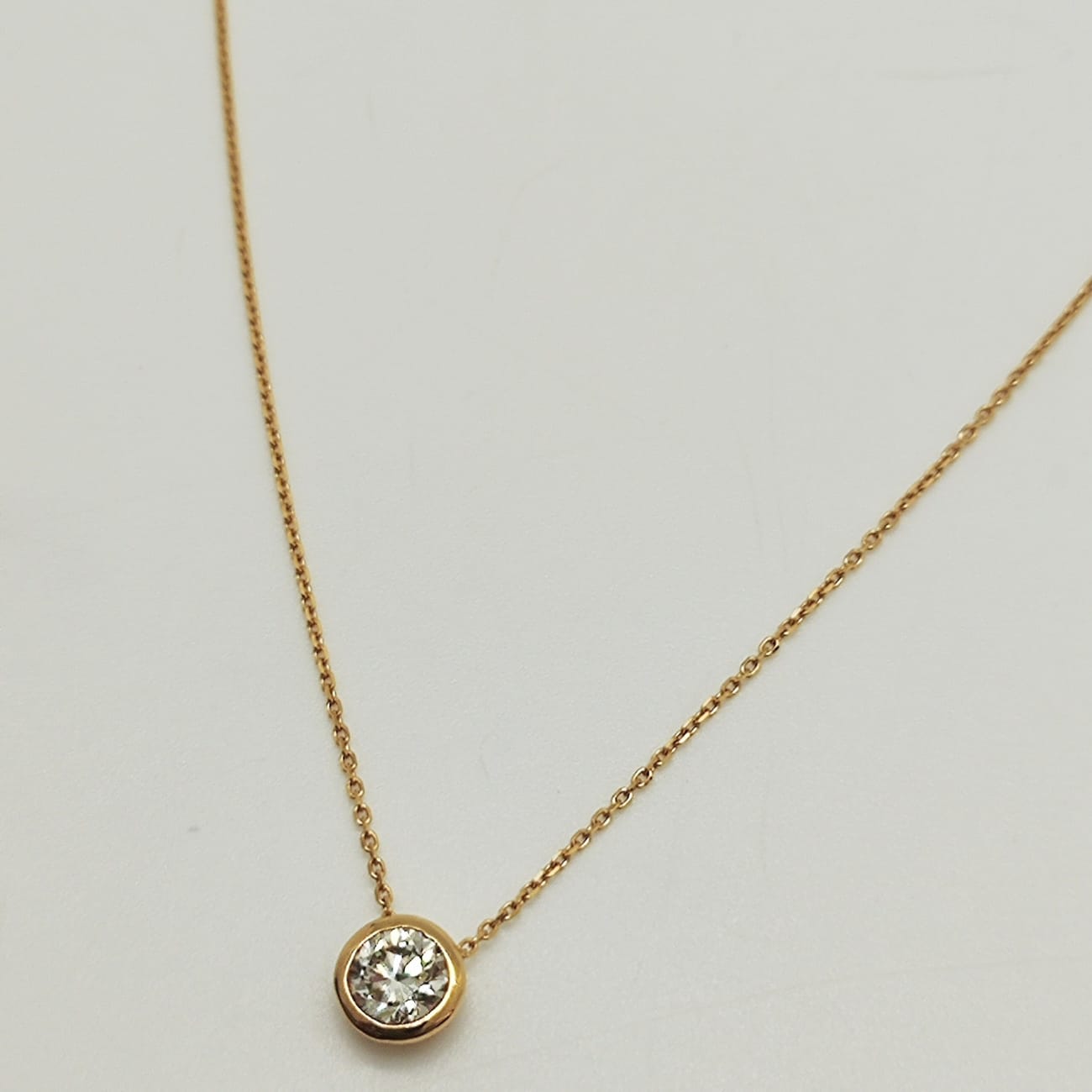 Punto de Luz Bisel 50 Puntos Oro Amarillo 18K